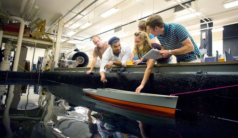 Students testing a hull design for a ship