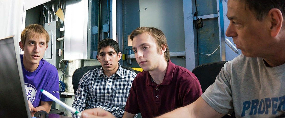 Undergraduates running an experiment in the Stability Wind Tunnel (Experiment 7)