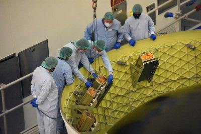 technicians at Kennedy Space Center integrating the CubeSats (Secondary Payloads) into the Orion Stage Adaptor. Williams worked on each one of them to ensure they were flight ready.